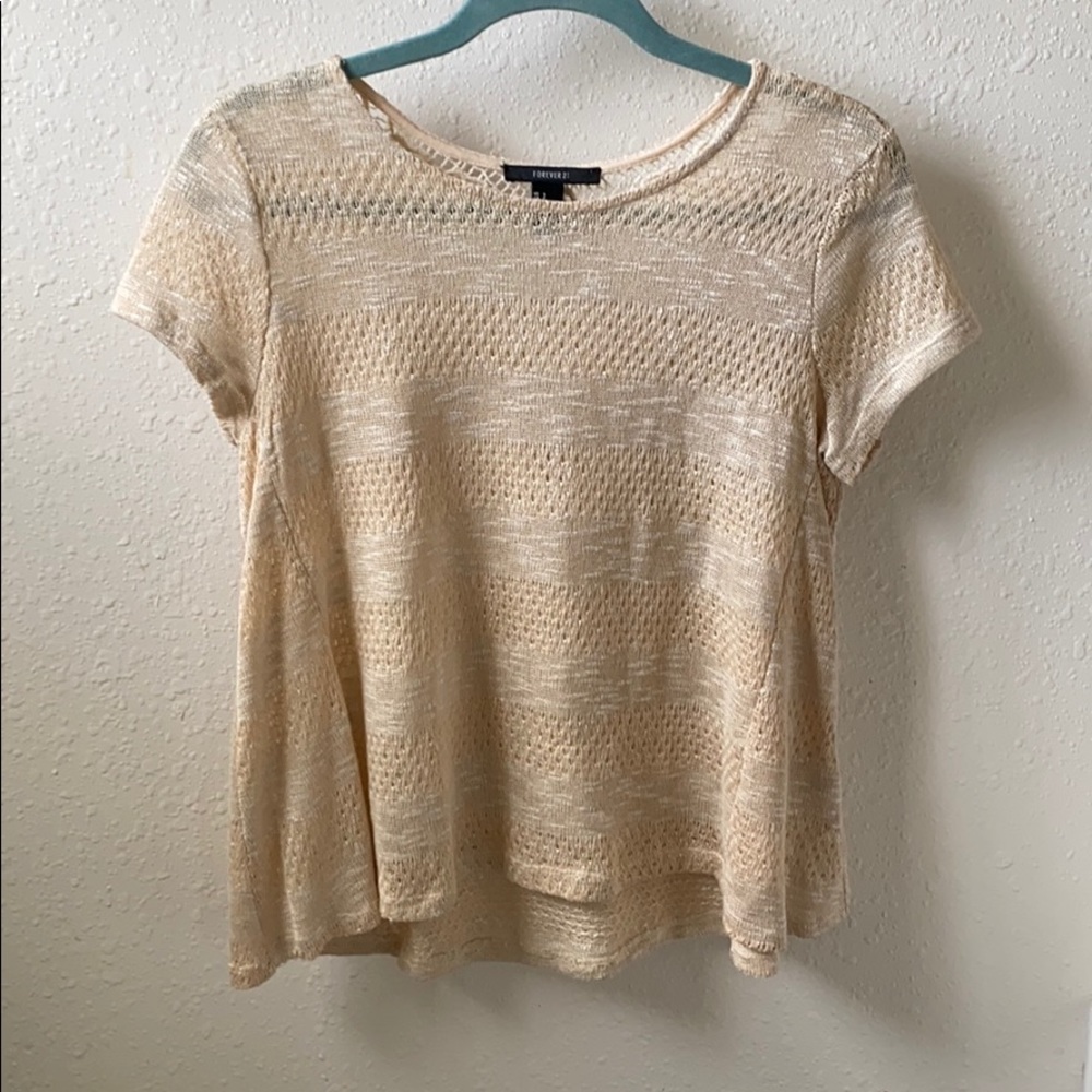 Embroidered flowy top.